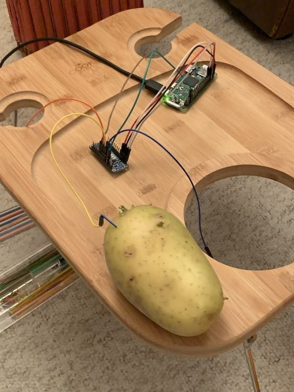 Photo of a potato hooks up to the Raspberry Pi Zero to test the concept.